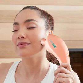 Face and Body Massager Peach features soft tissue vibration massage. Use all over your body